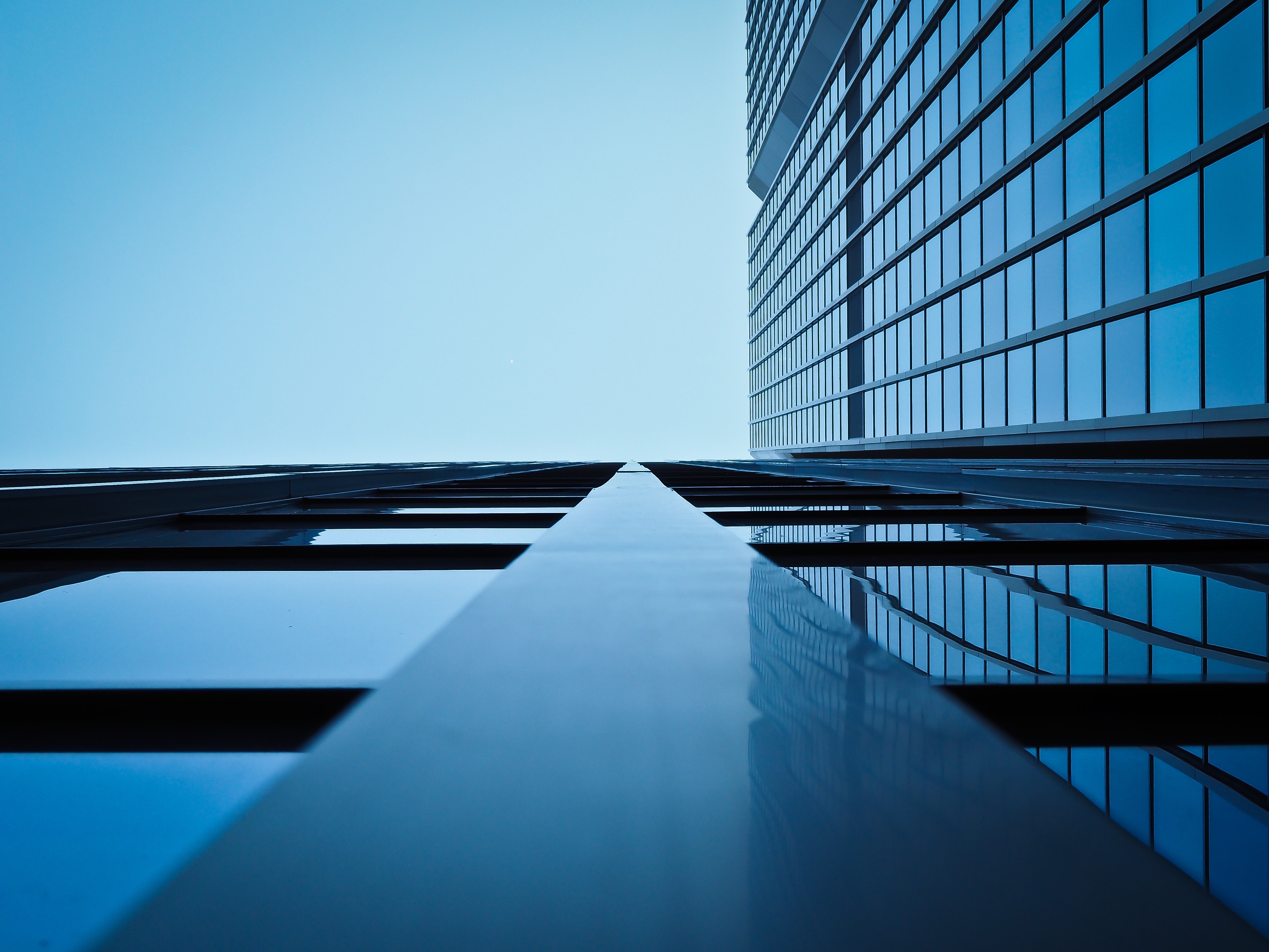 low angle view of office building against clear sky 258160 low angle view of office building against clear sky 258160